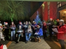 Carols around the Christmas tree