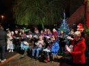 Carols around the Christmas tree