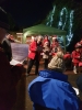 Carols around the Christmas tree