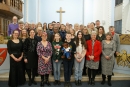 St John's choir with visitors, who sang at the Carol service