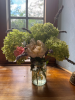 a jam jar of hydrangea 