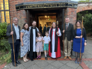Churchwardens, Dominic and his family with Bishop Kelly