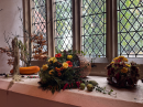flowers and harvest images on all the window ledges